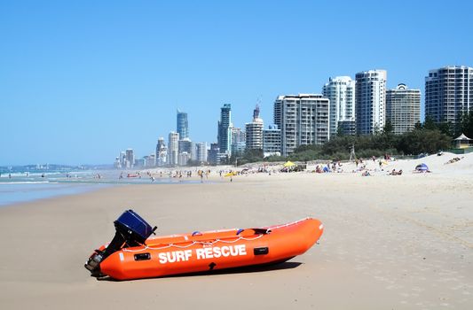 Surf rescue boat against the Surfers Paradise skyline on the Gold Coast Australia.