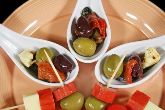 Delightful antipasto spoons and finger food ready to serve.