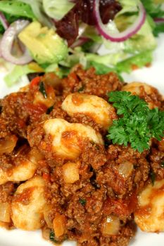 Beautiful gnocchi with hot Italian meat sauce.