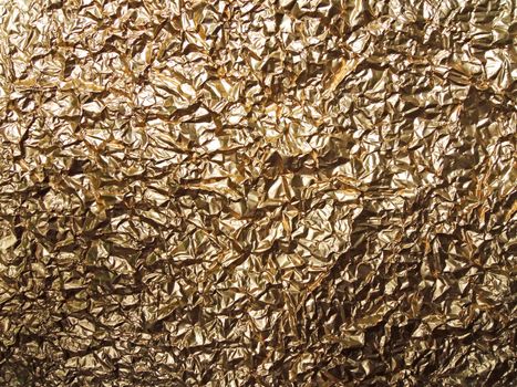 Golden aluminum foil texture background


