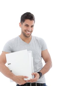 Happy young man holding a pile of folders against the white background