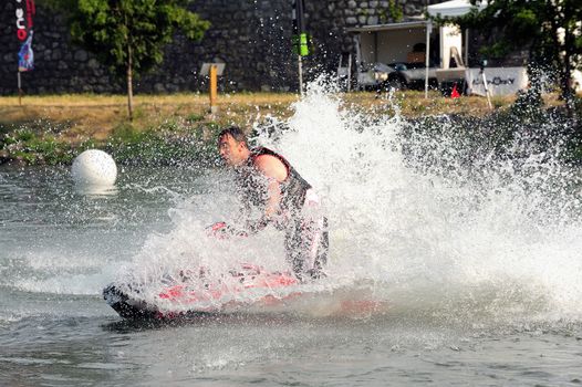 Ales - France - on July 14th, 2013 - Championship of France of Jet Ski on the river Gardon. lifting category or freestyle