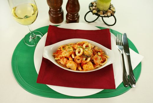 Delicious spaghetti marinara with fish, shrimps, calamari and mussels with a spicy tomato sauce.