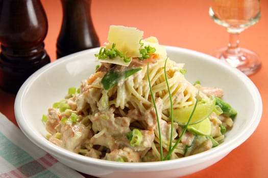 Delightful spaghetti with creamy snow peas and salmon.