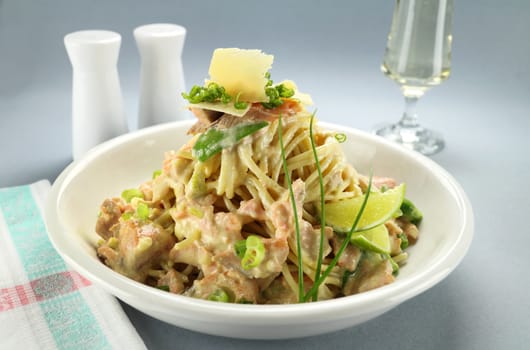 Delightful spaghetti with creamy snow peas and salmon.