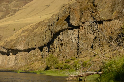 landscape of John Day River in Oregon with mountains