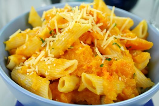 Creamy roasted butternut pumpkin penne pasta with parmesan cheese.