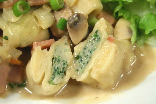 Homemade chicken and spinach tortellini ready to eat.