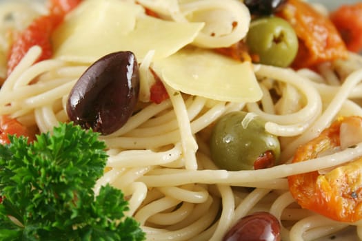 Delicious mediterranean style pasta with olives and sundried tomatoes.