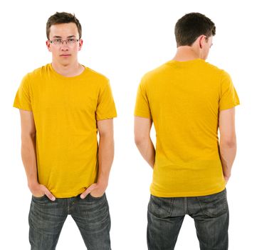 Photo of a male in his late teens posing with a blank yellow shirt.  Front and back views ready for your artwork or designs.