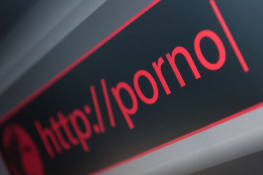 Close Up of Web Browser - Red Porno Sign in Address Bar - Shallow Depth of Field