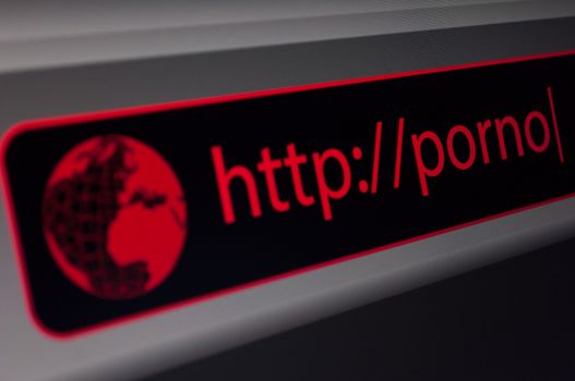 Close Up of Web Browser - Red Porno Sign in Address Bar - Shallow Depth of Field