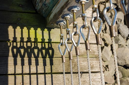 Abstract view of a fence casting deep shadows