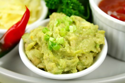 Guacamole Dip with chilli, salsa and cheese.