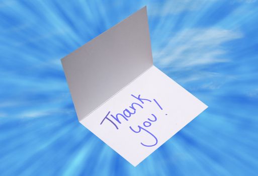 thank you card in the middle of a burst of sunrays for gratitude concept