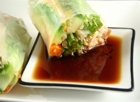 Delicious and healthy Vietnamese rice paper rolls with chicken and vegetables.