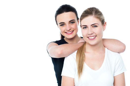 Young pretty caucasian girls posing casually