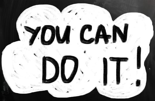 "You can do it" handwritten with white chalk on a blackboard.