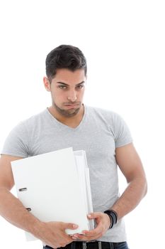 Muscular man holding a pile of folders over the white background