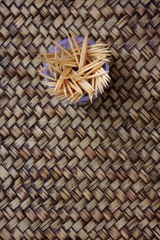 toothpicks in the bank on a bamboo background