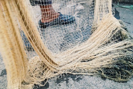 Fisherman pulling in his Fishing Net