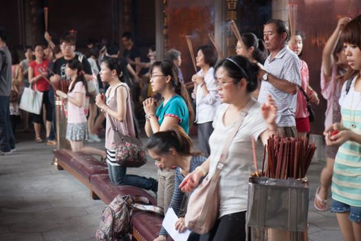 People worshiping at temple