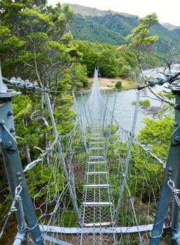 Swing bridge at North Mavora Lake in New Zealand