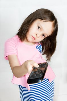 Asian child with remote control