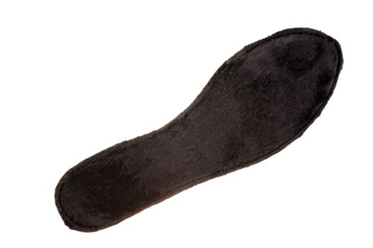 Heated insole of the boots in black on a white background