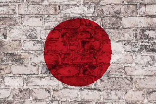 flag of japan graphic on brick background