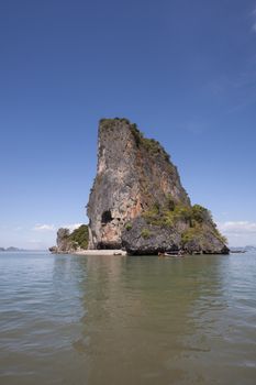 Small beach on Koh Nok, Phang Nga Bay, Thailand with boats