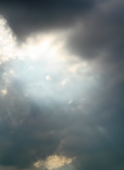 View of clouds in sky with rays of light