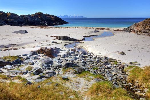 White beach and blue water, Norwegian fjord