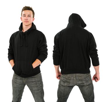 Photo of a male in his late teens posing with a blank black hoodie.  Front and back views ready for your artwork or designs.
