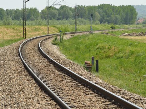 Landscape with Curvy Railroad Track Vanishing on Horizon