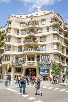 BARCELONA, SPAIN - MAY 31 View of the Casa Mila, better known as La Pedrera, designed by Antoni Gaudi, in Barcelona, Spain, on May 31, 2013. The building is the best exponent of modernist architecture