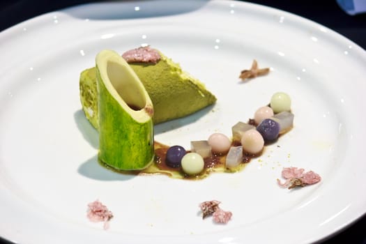Green tea rolled cake with Red bean sauce and Garnish with sakura jelly and dunko in The Thailand Ultimate Chef Challenge 2013