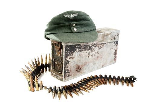 Kepi of the German soldier and machine-gun tape on a white background