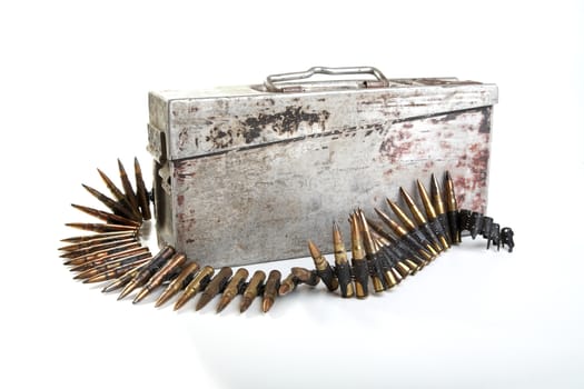 Machine-gun tape with cartridges of times  Second World War on a white background