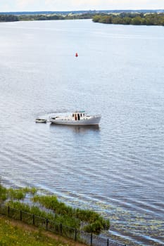 River launch with a boat  in the afternoon