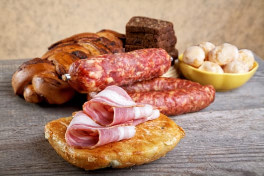 Still-life with bread slices of bacon