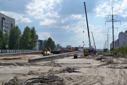 Construction of the new bridge on Melnikayte St., Tyumen, Russia.