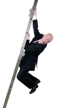 businessman hanging on to ladder isolated on white background