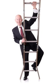 businessman starting on the ladder of success isolated on white