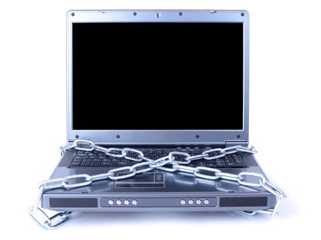 data protection  a chained up laptop on white background