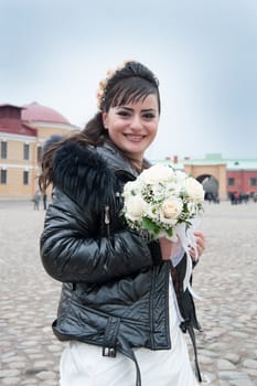 bride walks around the city