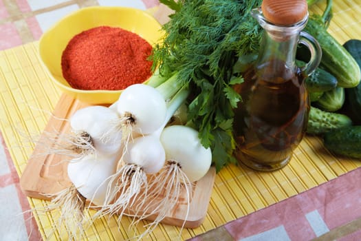 Still-life with vegetables spices and olive oil