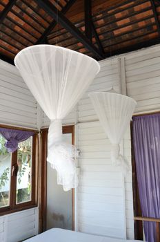 Hanging net inside bedroom, Thailand