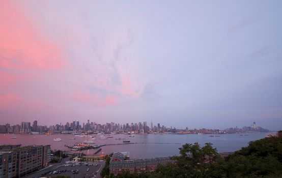 The panoramic view of the complete Manhattan Island at sunset from New Jersey side