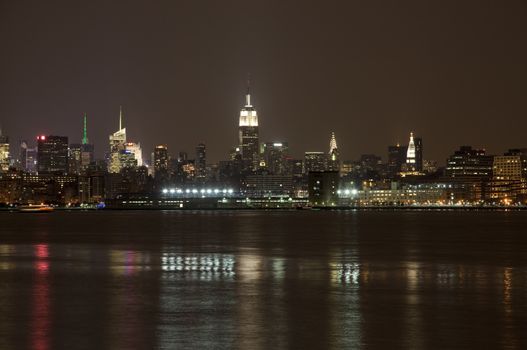 The New York City mid-town skylines at night 